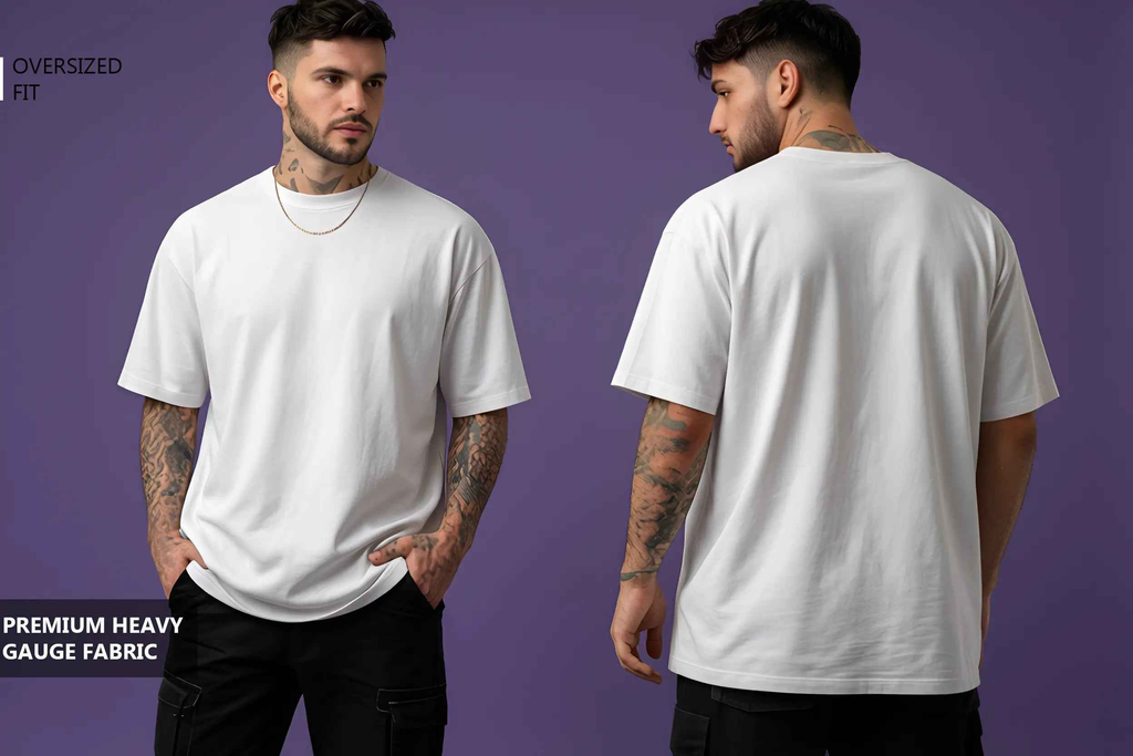 A model is wearing a white oversized t-shirt, standing against a purple background. The shirt features a relaxed fit and is paired with black cargo pants, showcasing a casual yet stylish look.